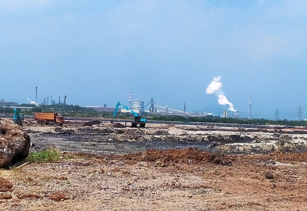 Cilegon’s horizon is filled with power lines and red-and-white chimneys of various industrial plants, affecting the city's air quality.