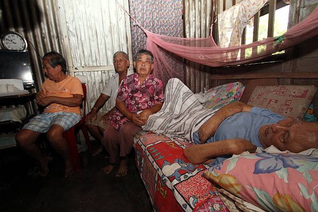 Poverty plight... The three elderly siblings who need assistance help at their home at Falim