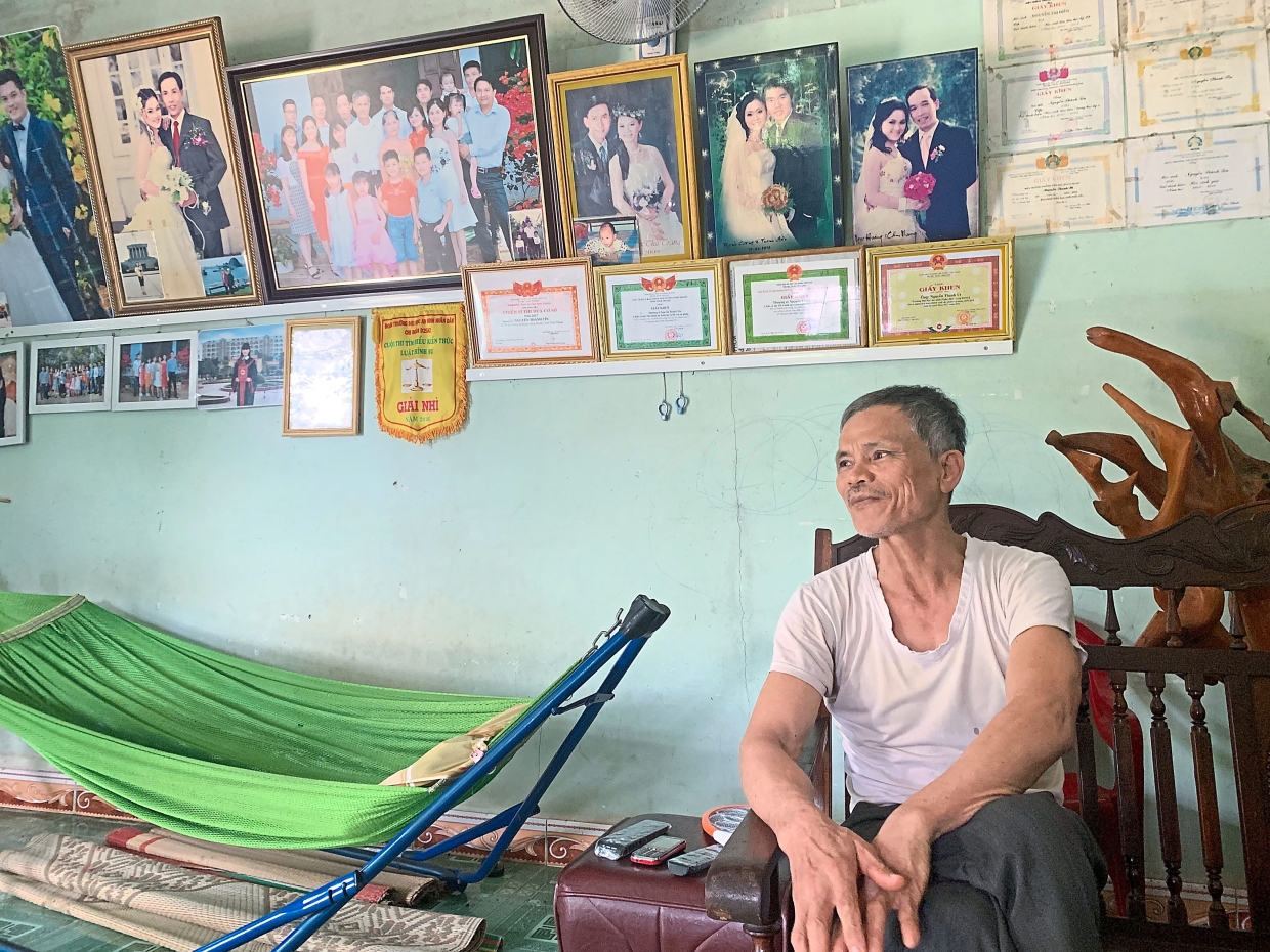 Family album: Nguyen is proud of the achievements of his children.