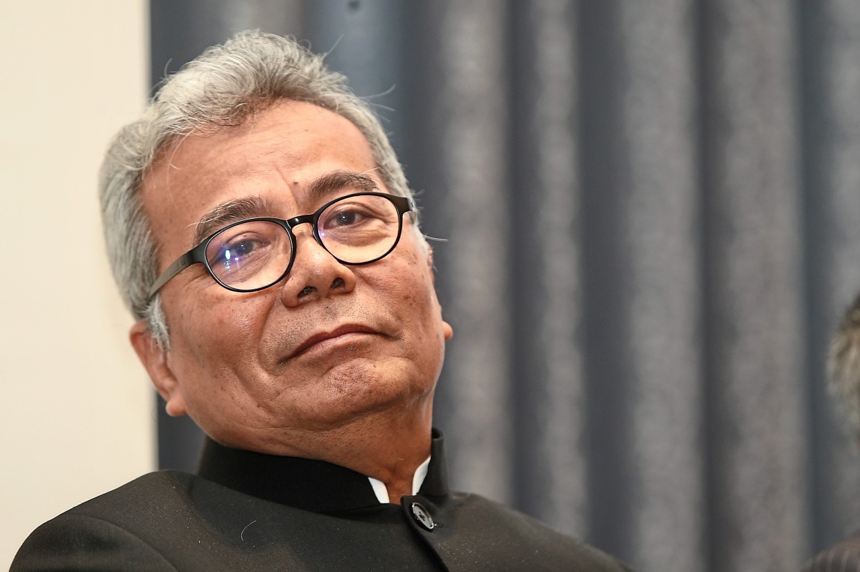 ‘It wasn’t me’: Redzuan has denied that he had released a video of him belittling a Chinese reporter for not knowing the Rukun Negara at a press conference but some are still urging him to apologise for his racist remarks.