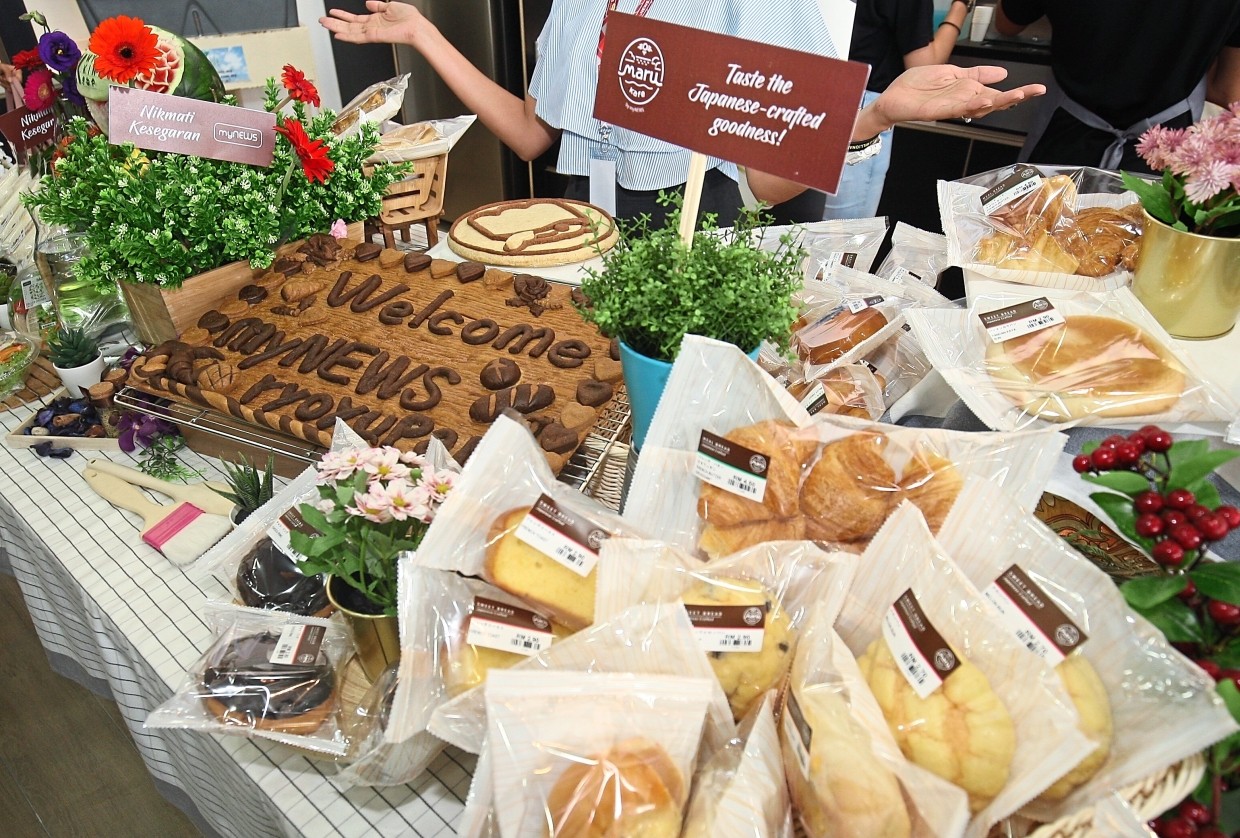 Baked goods by myNews Ryoyupan on display during the launch.