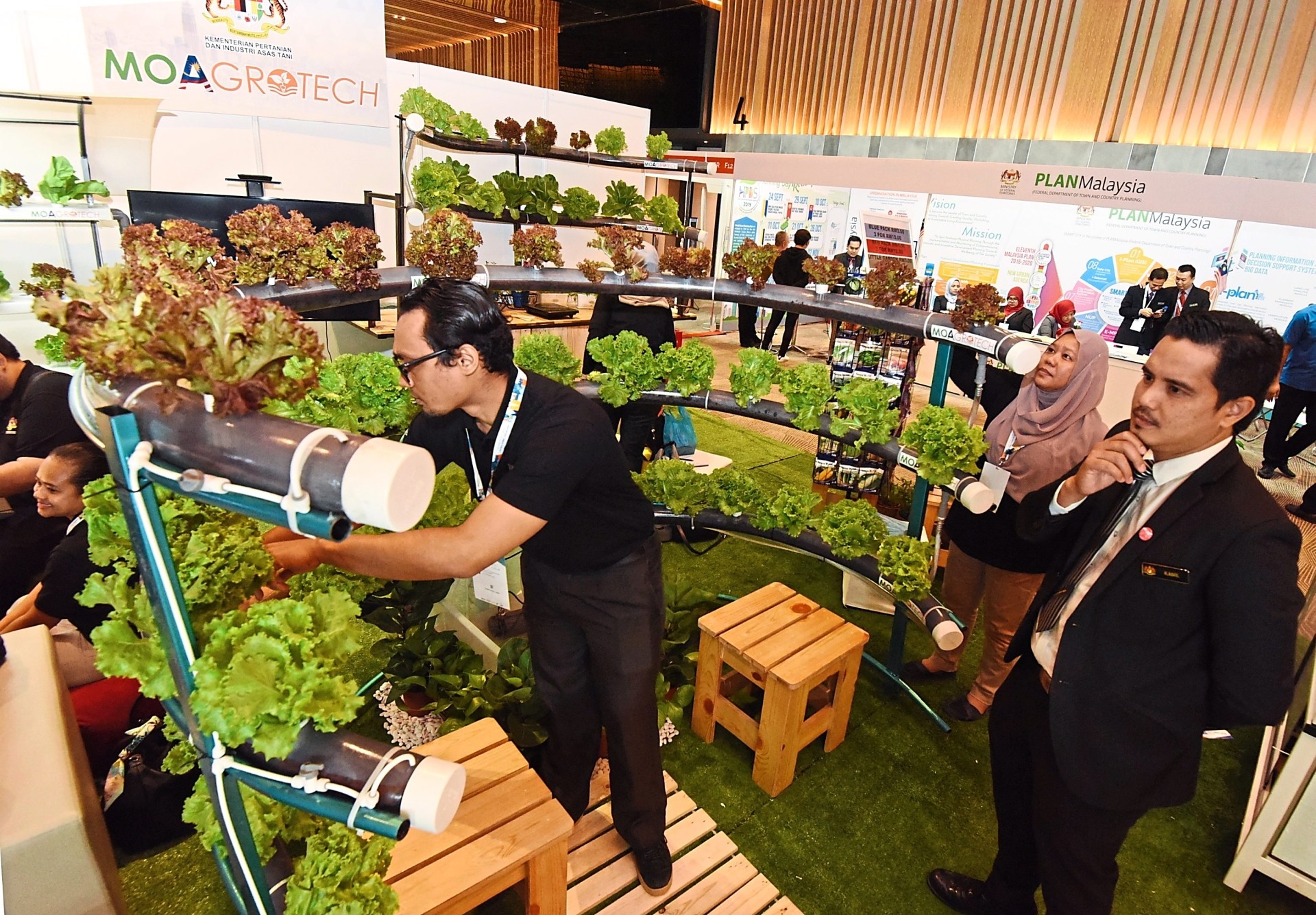 Aquaponics display at a booth.