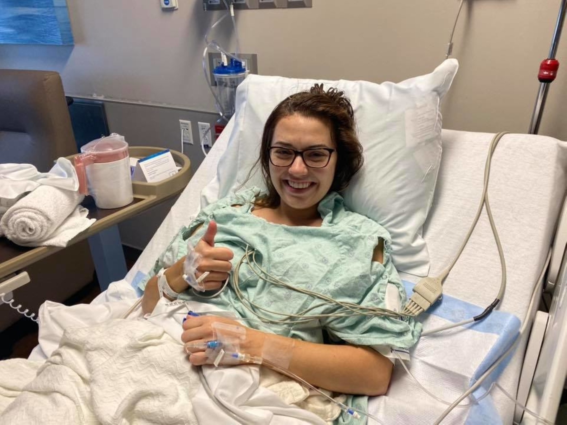 Chardt, 25, smiles after undergoing brain surgery.