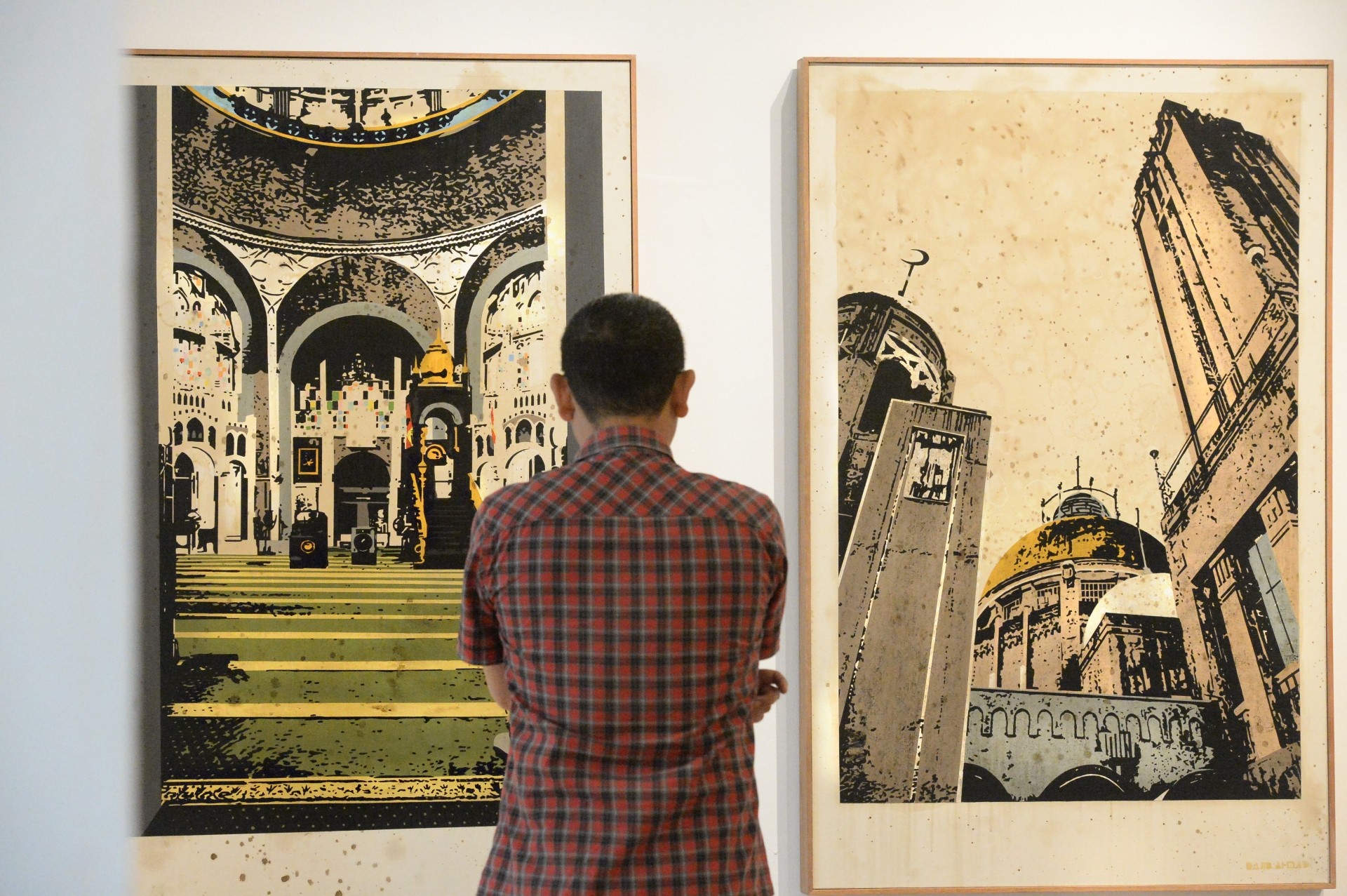 Najib Bamadhaj's 'Sultan Sulaiman Mosque II' (acrylic and bitumen on linen, 2019) and 'Sultan Sulaiman Mosque I' (acrylic and bitumen on linen, 2019). Photo: The Star/Ong Soon Hin