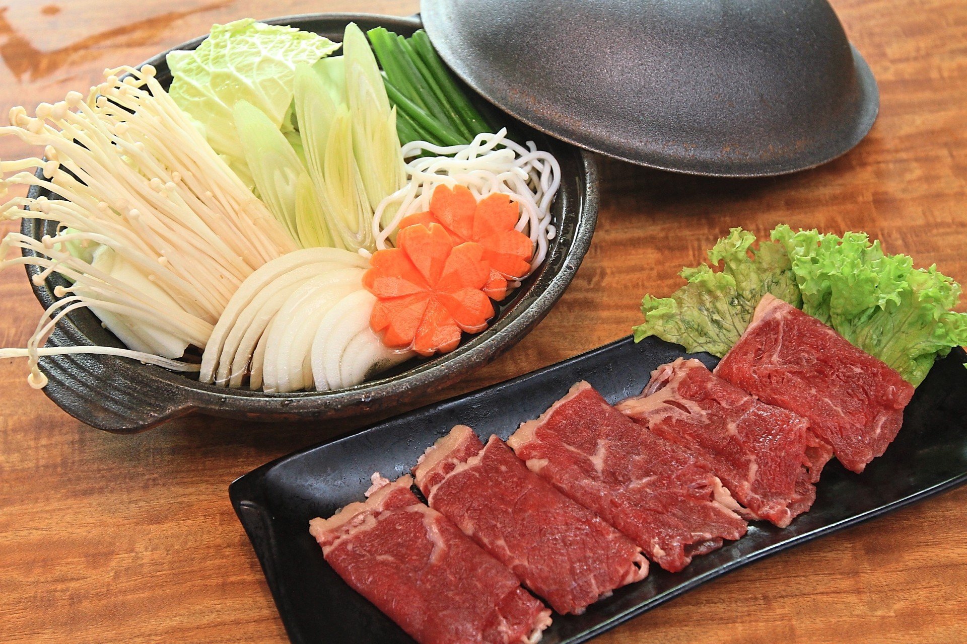 Sukiyaki-Style Zen Beef Set is one of the new beef dishes. The beef slices are served raw, then dipped in boiling soup.