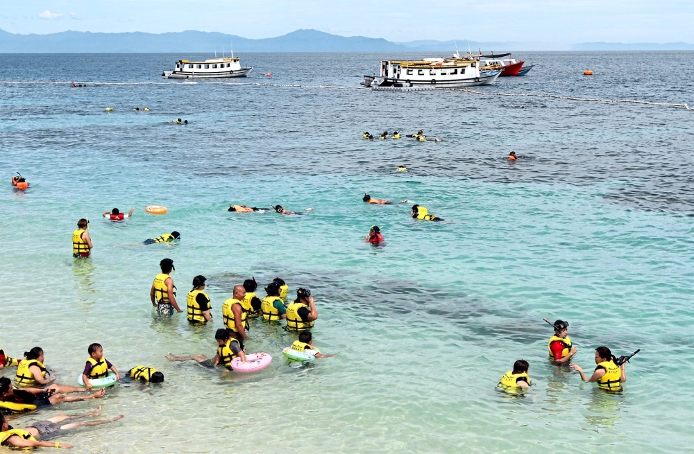While it is great to have more tourists coming to our shores, concessions must be made to ensure our natural treasures like islands and forests, remain undamaged. — Filepic