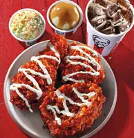 White barbecue sauce chicken and  golden shrimp treats for festivities