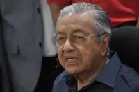 Bersatu to wait for law to run its course before further action over drug party issue, says Dr M