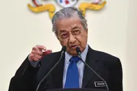 English to be used to teach Math, Science again, says Dr M