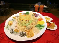 Golden ‘mice’ yee sang to commemorate zodiac year
