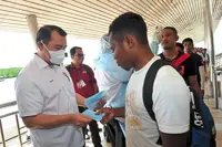 Health screening for passengers at Kukup Ferry Terminal