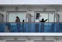 Pounded by critics, Japan defends handling of Covid-19 outbreak