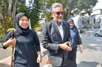 Activist-lawyer Fadiah arrives at Bukit Aman for questioning over tweet