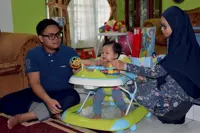 Toddler feeding well, recovering after tumour removed