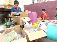Brothers collect books, toys and stationery for needy children