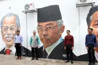 Mural artists honoured as King and Queen visit site in Taman Cahaya Alam