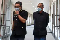 Ambrin was asked to remove his opinion on audit report, court told