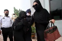 Covid-19 quarantine: Woman, 72, with pink tag spotted eating out fined RM8,000, jailed one day