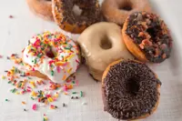 Teenagers, not wearing masks, attack manager after being refused free donuts