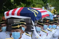 Iban war hero Awang Raweng laid to rest with military honours