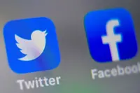Thailand takes legal action against Facebook, Twitter over content