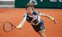 Rublev swats aside Anderson to reach fourth round in Paris