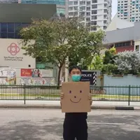 Singapore activist charged for one-man smiley face protest