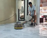 This grandma has been grinding marble floors for over 40 years