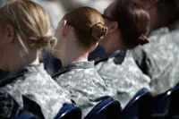 Ponytails and lipstick: US women soldiers get style