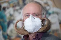 World beard champion has face mask tailored to his giant mutton chops