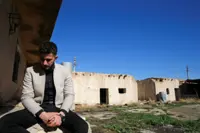 Seven years on, Yazidi survivor buries father slain by Islamic State