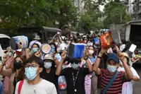 Four killed in Myanmar protests as junta cracks down on online critics