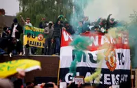 Soccer-Man United fan group demand owners launch new share scheme