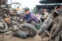 Vehicles' final resting grounds in Vietnamese village