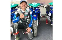 Ammeer makes juggling books and   bike look easy