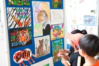 Love for big cat leads student, schoolmates to raise over RM40, 000