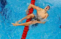 Olympics-Swimming-American Kalisz savours redemption with Tokyo gold