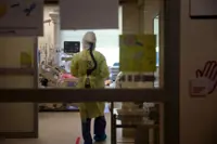 Singapore expects more severe cases of Covid-19 as numbers triple in 2 weeks