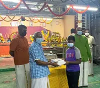 Temple gives needy pupils tablets to help with online lessons