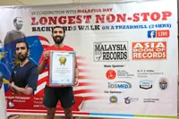 Tireless frontliner Sivarajan ‘walks’ into Malaysia   and Asia   Book of Records