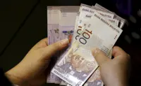 Ringgit lower as greenback gains on higher inflation