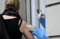 Merkel makes farewell plea for Germans to get vaccinated