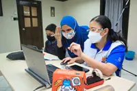 Teachers of deaf students learn coding