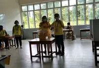 Sarawak Polls: GPS' Dr Sim casts vote for Batu Kawah seat