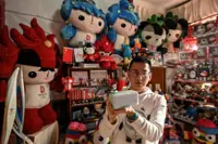 Chinese superfan spends thousands on Olympic souvenir obsession