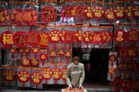 Muted festive celebrations across Asia amid fears of Omicron