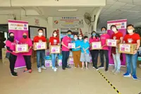 Charity arm spreads festive cheer to two homes in Selangor