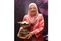 The prof with the pearls: An education icon we can all be proud of