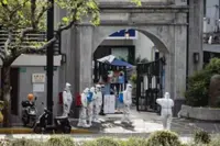 Shanghai reinforces lockdown rules amid spike in Covid deaths