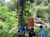 Warning signs   at waterfalls   highlight  lurking danger
